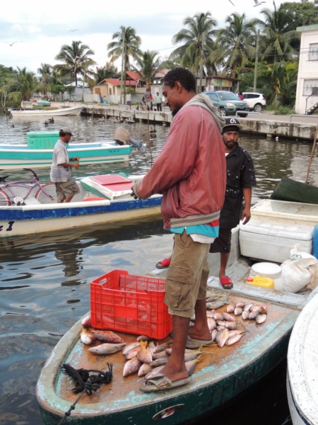 Shopping on a boat, Belize City, Belize