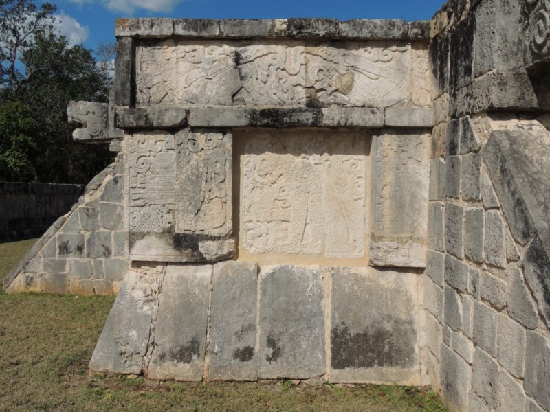 Reliefs on the side wall of the platform, Chichen Itza, Mexico