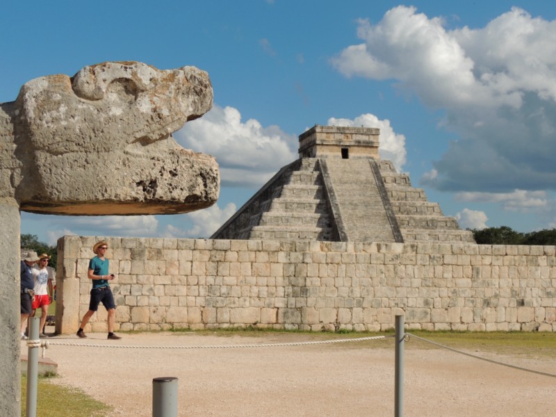 Head of the Feathered Serpent and El Castillo, Chichen Itza, Mexico