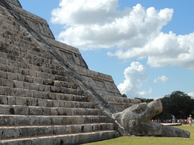 Feathered Serpent guards the entrance to the temple, Chichen Itza, Mexico