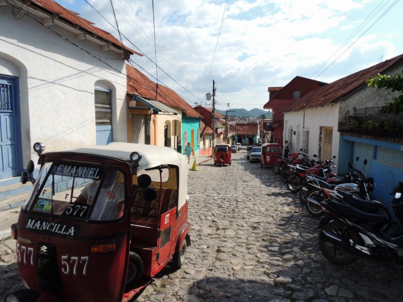 Motorcycles and tuk-tuks reign in Flores, Flores Island, Guatemala
