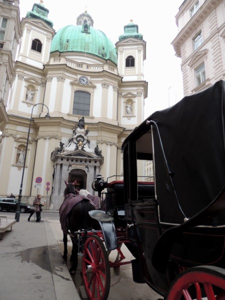 Cab in front of St. Peter's church, Vienna, Austria